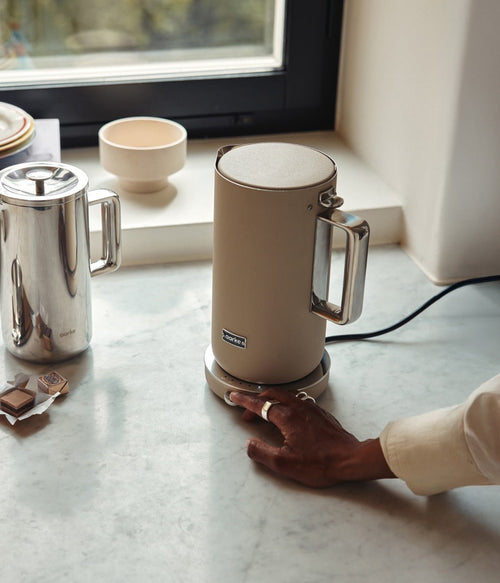 Aarke Kettle Sand in a kitchen setting